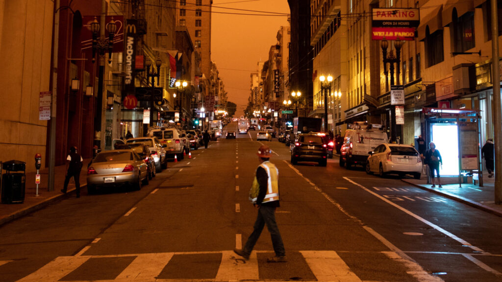 photo of person surveying a city